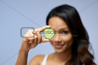 Asian girl using beauty cream and cosmetics