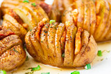 Accordion baked potatoes with bacon