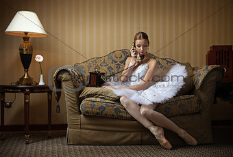 Professional ballet dancer talking on the phone