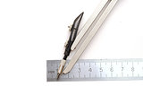 compasses and ruler on a white paper