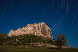 Mountaine and startrails in sky