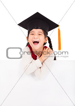 happy school girl holding blank billboard