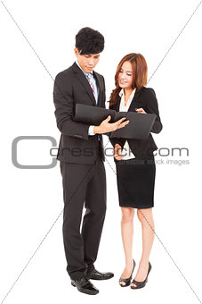 Business people standing and  reading  document together