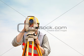 Surveyor engineer taking measurements