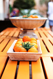 fresh orange fruits decorative on table in summer