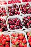 sweet red cherry closeup macro on market outdoor