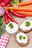 fresh tasty homemade cream cheese and herbs with bread