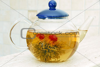 Flower tea in glass pot