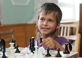 Girl plays chess