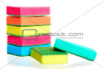 stack of sponges for washing dishes, and two nearby