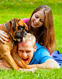 happy young couple with dog