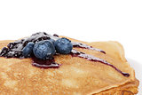 traditional homemade blinis or crepes with blueberries