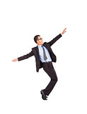 businessman feel happy to raise his hands and dancing 