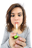 Close up of a woman addicted to smoke lighting on a cigarette