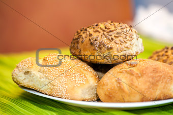 Fresh bread rolls with sunflower and sesame seeds