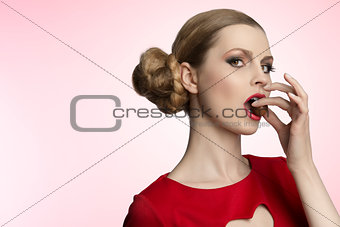 pretty woman eating praline