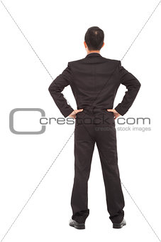 businessman standing  and put hand on waist.