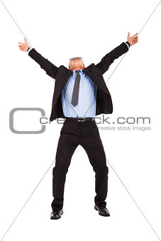 happy businessman raise arms up to celebrate  