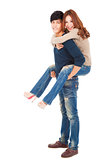 full length young couple standing and hugging