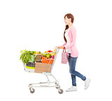 happy young woman with  shopping cart