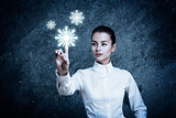 Woman Pointing at Glowing Snow Icon