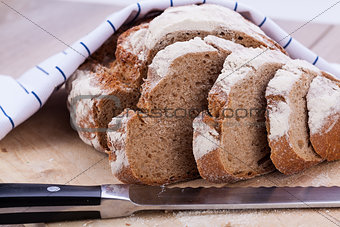 homemade fresh baked bread and knife 