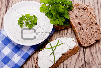 fresh tasty herbal creme cheese and bread 