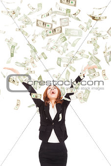 happy businesswoman try to catch the money