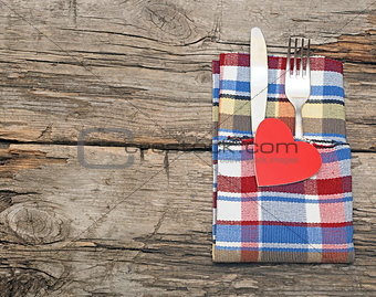 Cutlery set with colorful napkin and heart 