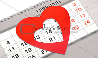 Red heart shape marker on calendar page showing February 14 Vale