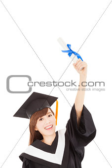 Young graduate girl student holding diploma and hand up