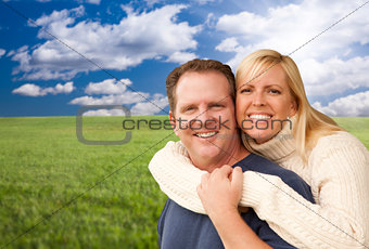 Happy Attractive Couple Hugging at the Park