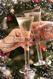 Man and Woman Toasting Champagne in Front of Lights
