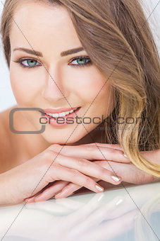 Smiling Beautiful Woman Resting on Hands