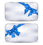 Set labels with blue gift bows isolated