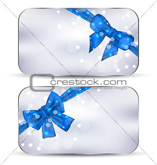 Set labels with blue gift bows isolated