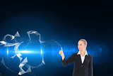 Composite image of young blonde business woman pointing