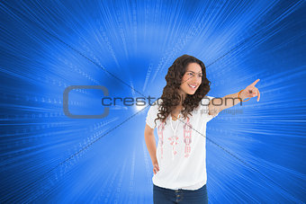 Composite image of cheerful attractive brunette wearing casual clothes pointing