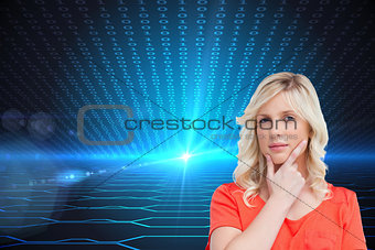 Composite image of teenager standing upright thoughtfully with her fingers on her chin