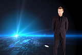 Composite image of young businessman looking at the camera