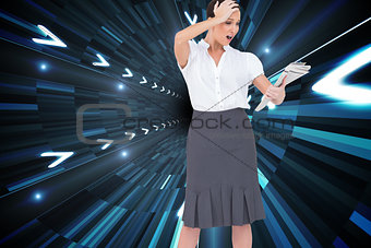 Composite image of surprised classy businesswoman holding newspaper