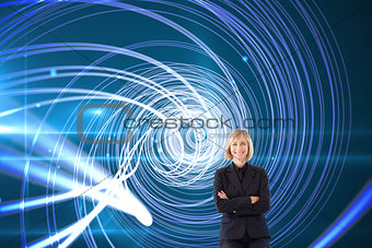 Composite image of friendly businesswoman smiling at the camera in a meeting