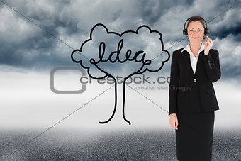 Composite image of good looking woman in suit using headphones and posing