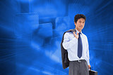 Composite image of portrait of a businessman holding a briefcase and his jacket on his shoulder