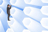 Composite image of businessman standing on ladder using binoculars