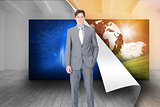 Composite image of portrait af a charismatic businessman standing