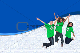Composite image of enviromental activists jumping and smiling
