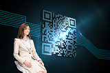 Composite image of smiling businesswoman sitting