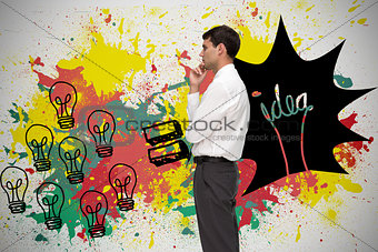 Composite image of thoughtful young businessman looking away