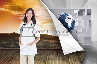 Composite image of confident and smiling woman doctor standing in front of the window